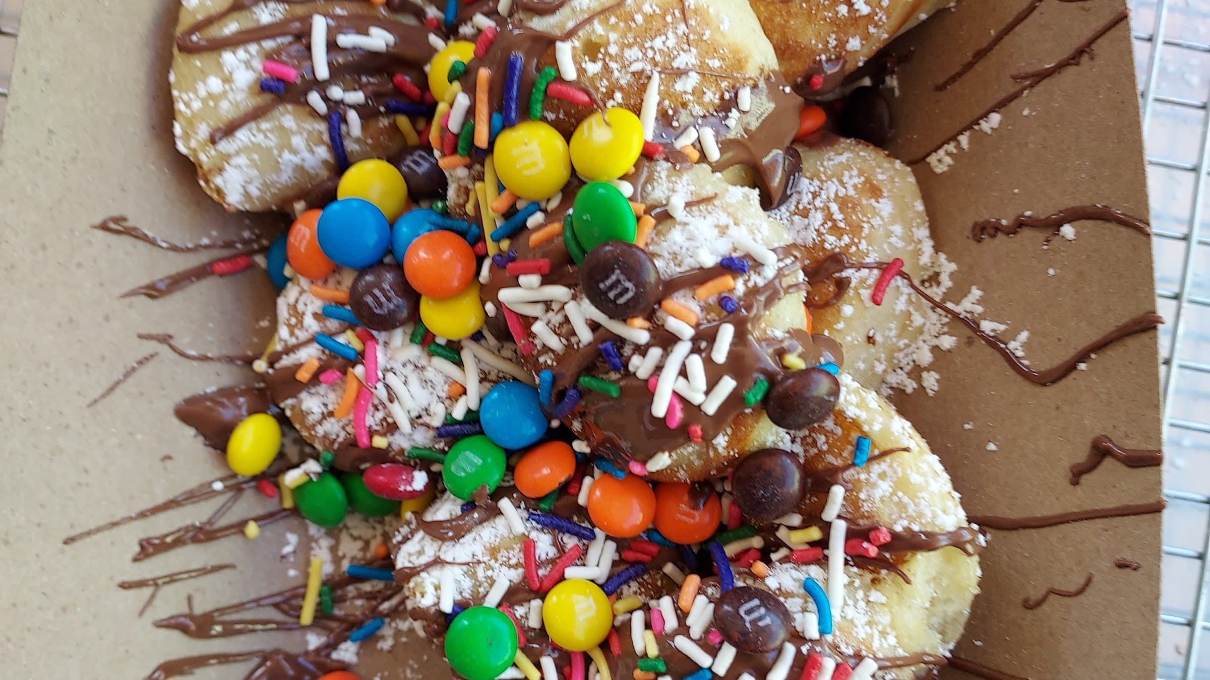 Mini pancakes loaded with chocolate, M&M's and sprinkles served at a Cincinnati corporate event